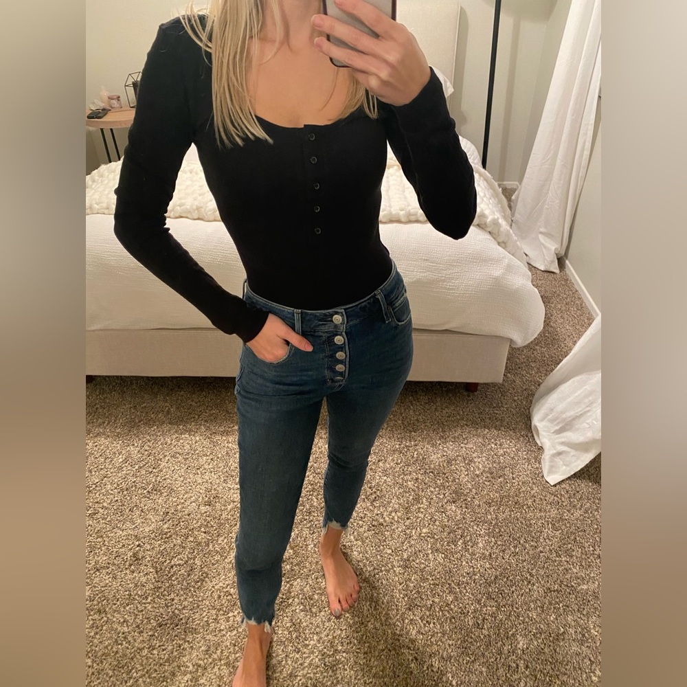 Black long sleeve bodysuit with button down detail